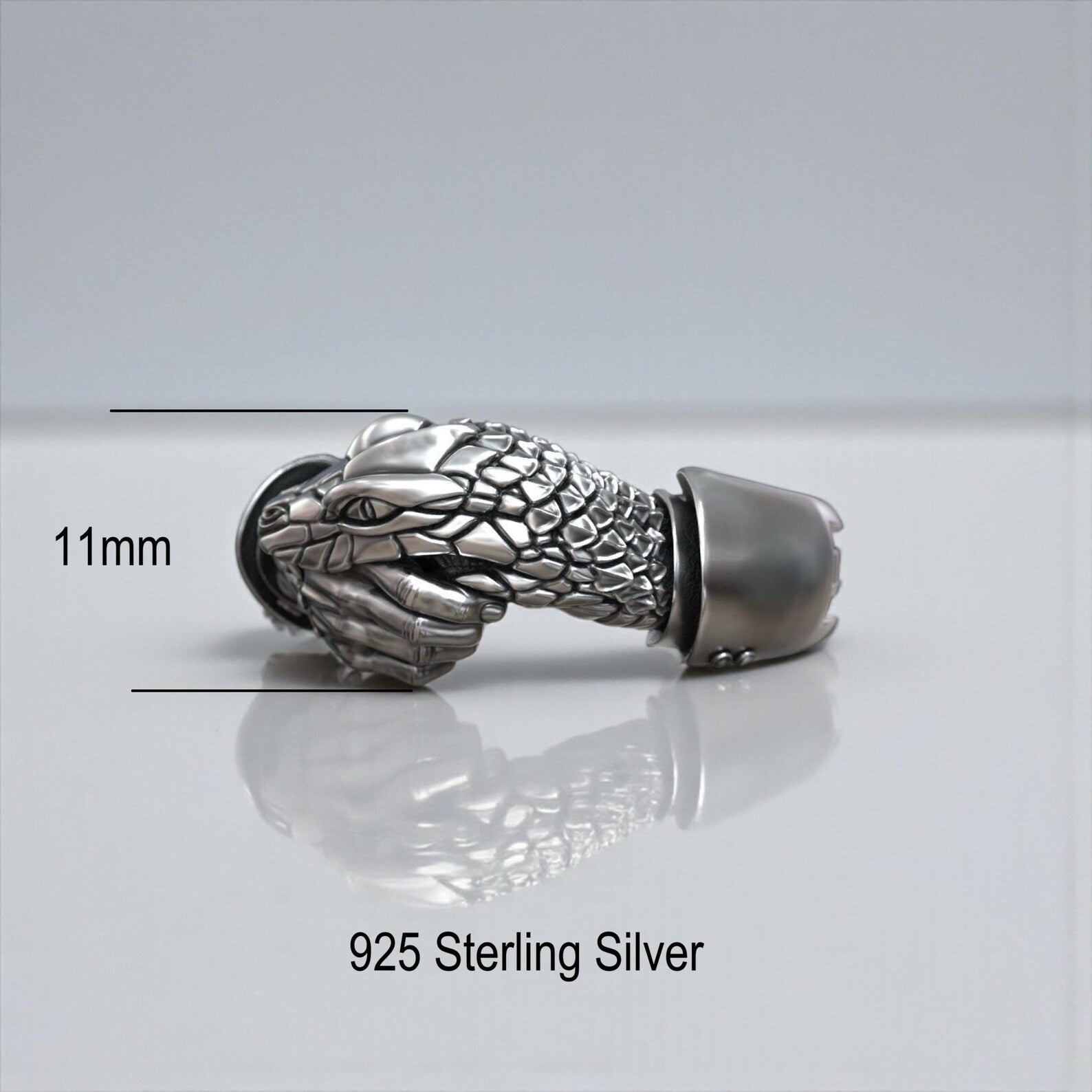 
Sterling silver snake and hand ring symbolizing trust, betrayal and dominance, featuring gothic engraving and handcrafted details, perfect as a personalized gift for a rebellious spirit
