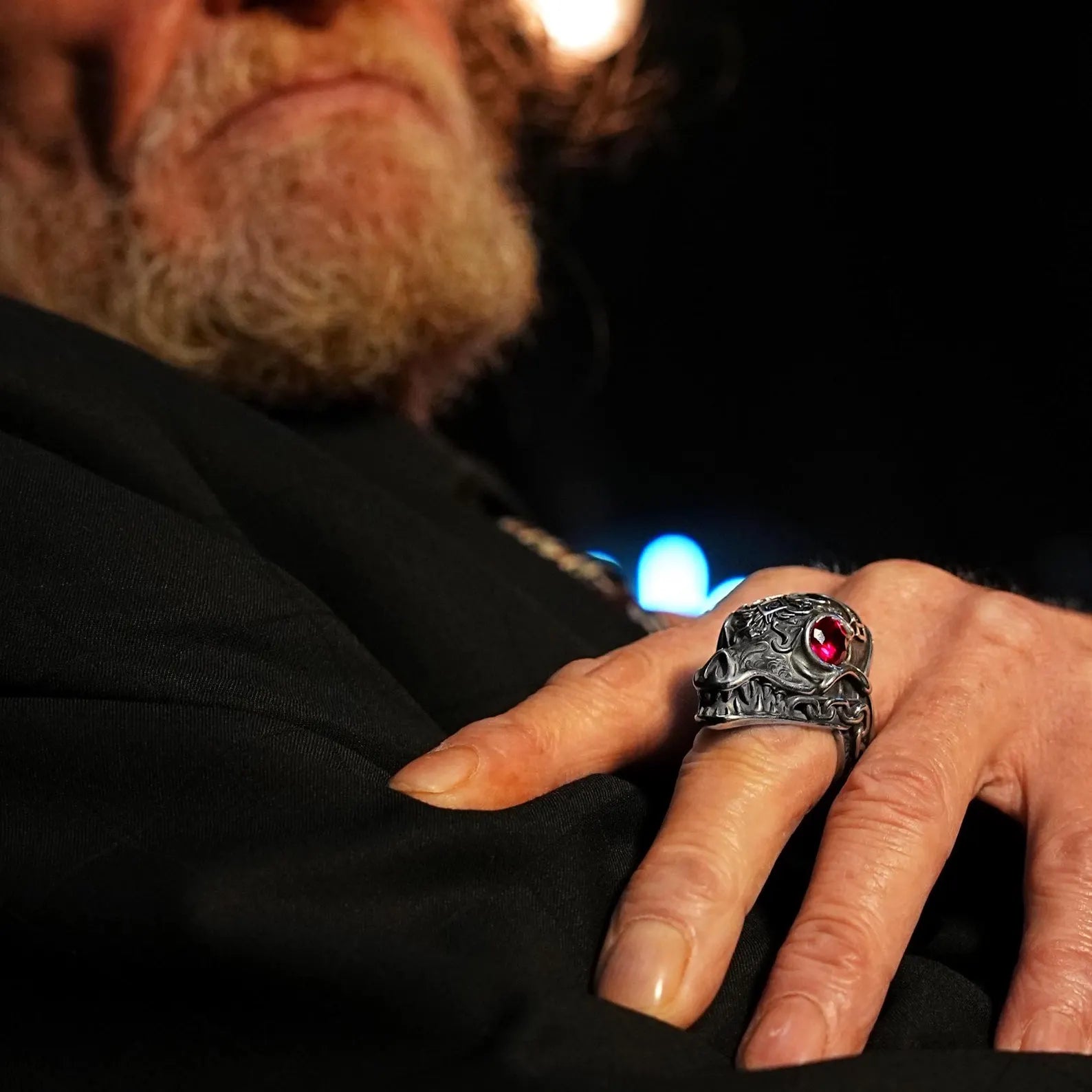 Set against a minimalist white background, this Men’s Morior Invictus skull ring stands out with its striking gothic design and warrior-inspired symbolism. Handcrafted in sterling silver, this statement piece blends biker edge, alternative fashion, and spiritual strength into one unforgettable men’s ring.