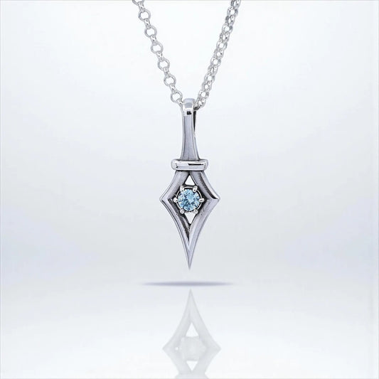 Minimalist sterling silver necklace featuring a handcrafted gothic pendant with a sparkling aquamarine gemstone. This unique design blends elegance with bold gothic style, making it the perfect jewelry gift for her. A meaningful March birthstone necklace ideal for birthdays, anniversaries, or special occasions.