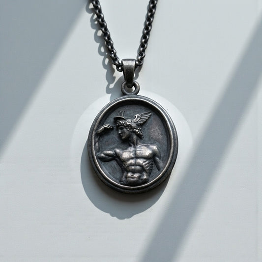 Handcrafted mythology inspired Hermes pendant necklace for men made from solid sterling silver featuring detailed Greek god engraving bold masculine statement jewelry