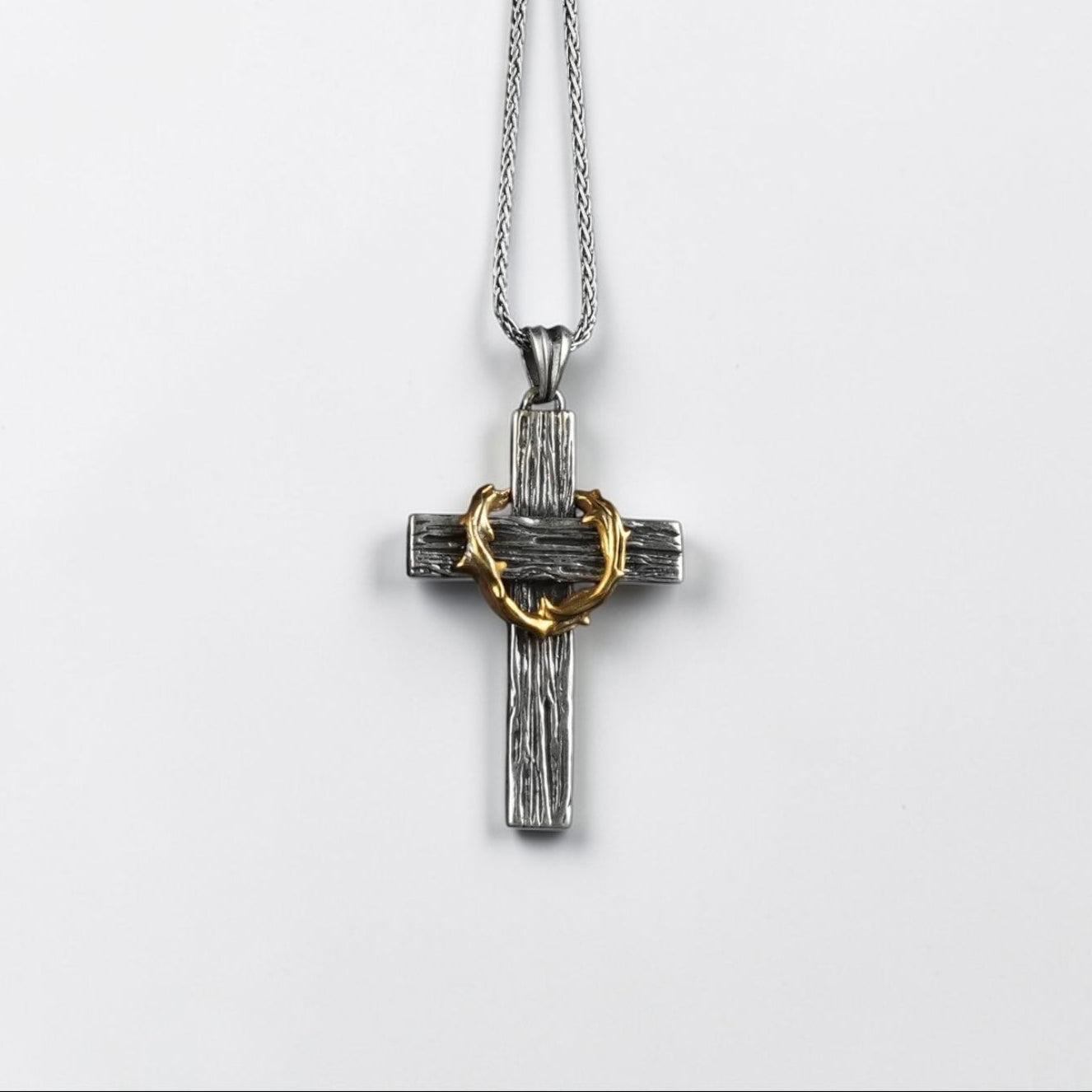 Discover the unique beauty of our handmade Silver Cross with Thorn Pendant, a stunning piece that seamlessly blends faith with artistry.