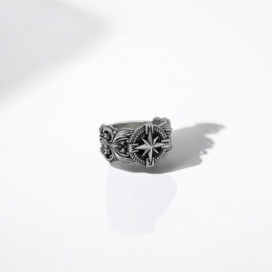 Sterling silver men's compass ring featuring a bold nautical design with intricate maritime detailing. This handcrafted signet ring symbolizes direction, purpose, and adventure—perfect for sailors, travelers, and free spirits. Ideal for Shopify listings, Pinterest gift boards, and Google search optimization.