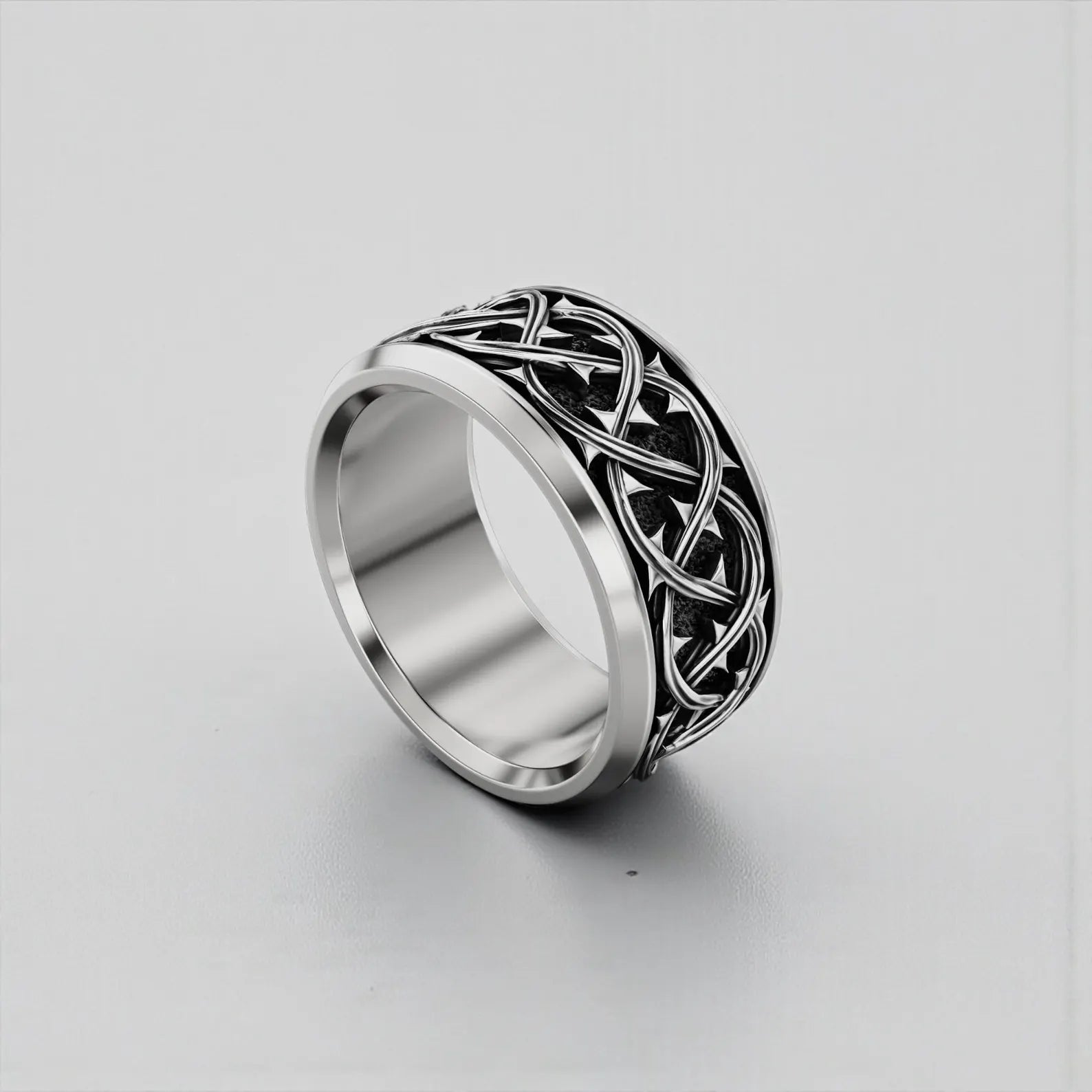 High-quality handcrafted sterling silver band ring featuring an ornate thorn crown motif, created for collectors of religious and Gothic jewelry with a strong masculine aesthetic