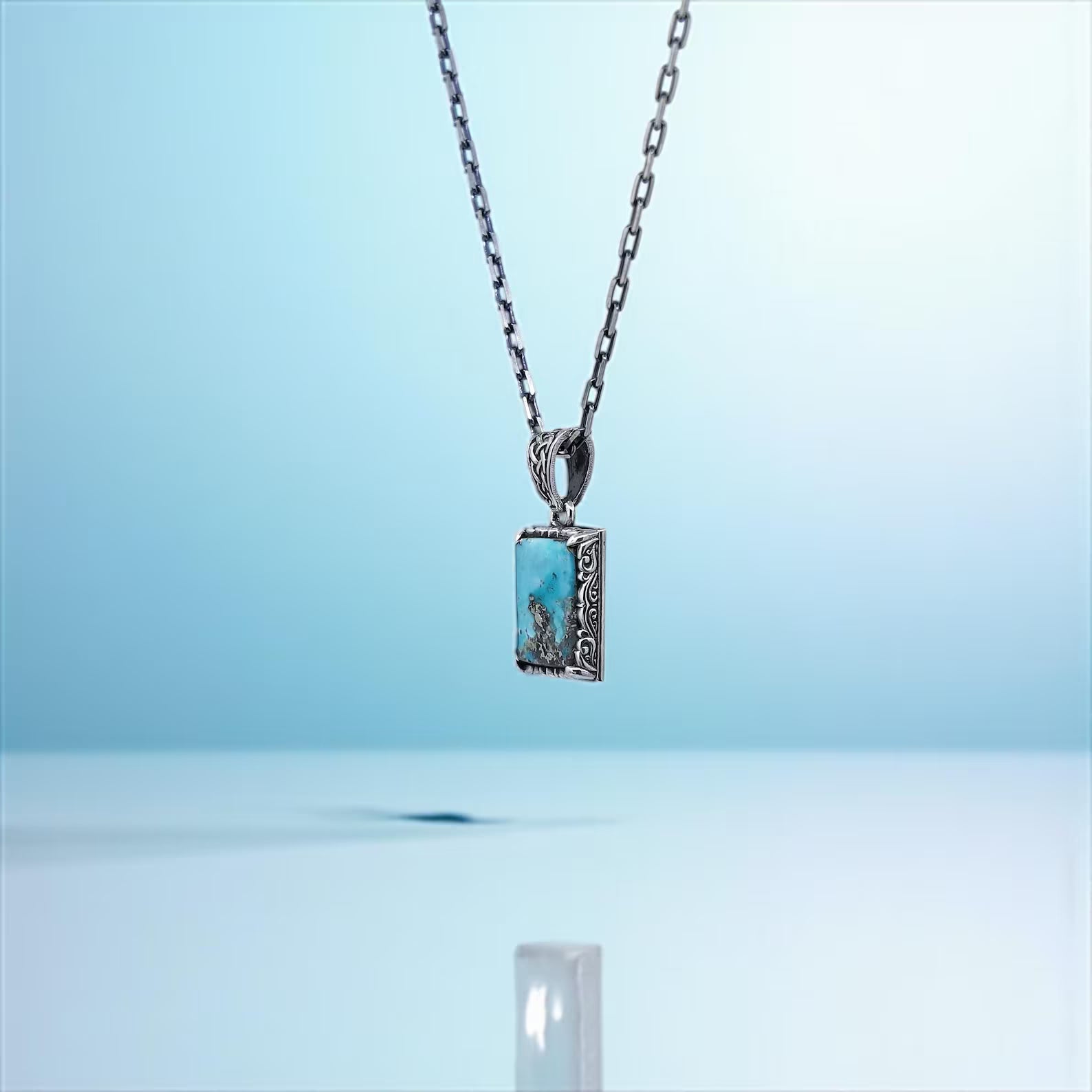 Add a touch of color and elegance to your collection with this handcrafted necklace. The rich turquoise stone set in sterling silver makes this pendant a versatile accessory for any occasion. A stunning gift idea!