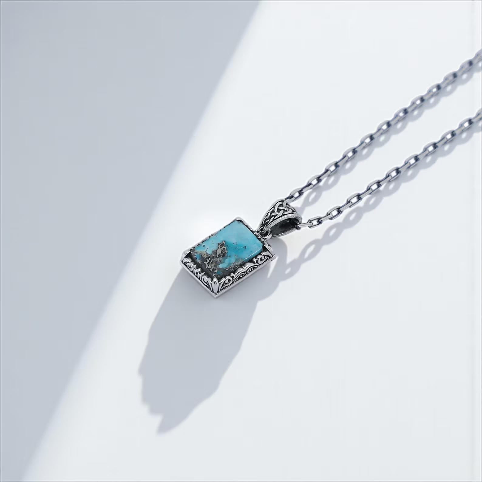 Elevate your everyday look with this exquisite silver and turquoise necklace. The finely detailed ethnic design highlights the beauty of the gemstone, making it a standout piece for both men and women.