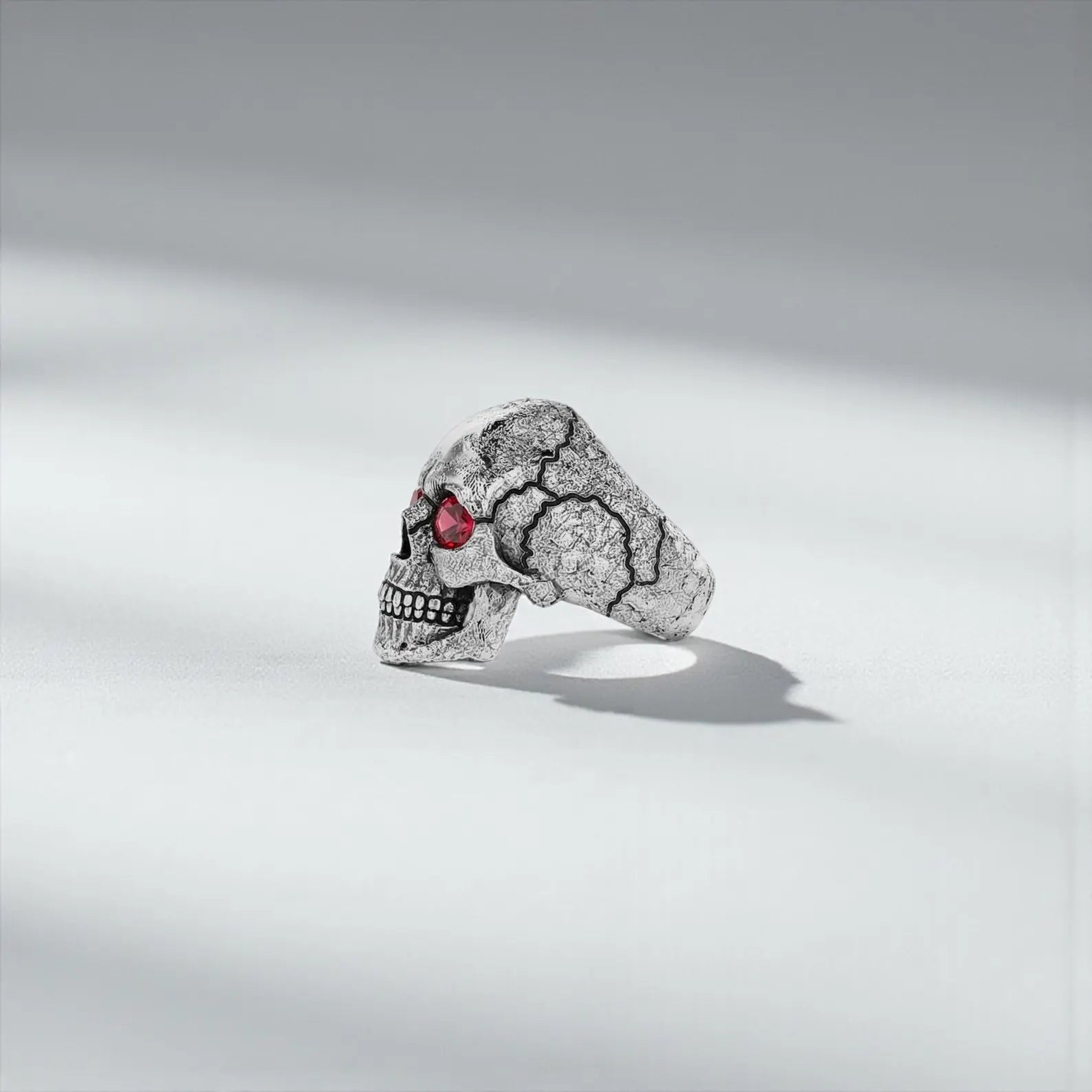 Unique biker skull ring with gemstone inlay crafted from solid 925 silver, combining Navajo inspiration with modern gothic style. Designed with a 2.5mm band thickness and a durable matte brushed finish, this ring suits men who appreciate bold, rugged jewelry. Perfect gift for anniversaries or holiday celebrations.