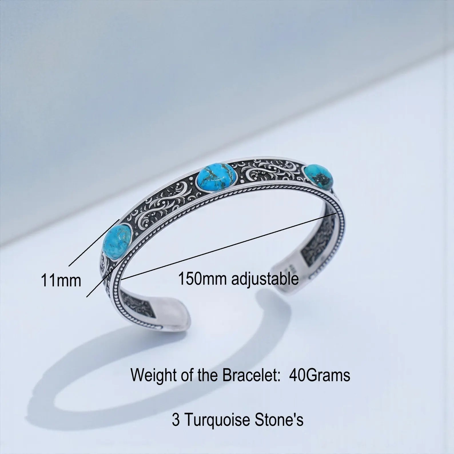 Premium 925 sterling silver men’s cuff bracelet with vibrant turquoise cabochons, oxidized Western-inspired design, and detailed engraved patterns. Adjustable Southwestern turquoise bracelet for boho style lovers seeking unique handmade gemstone jewelry.
