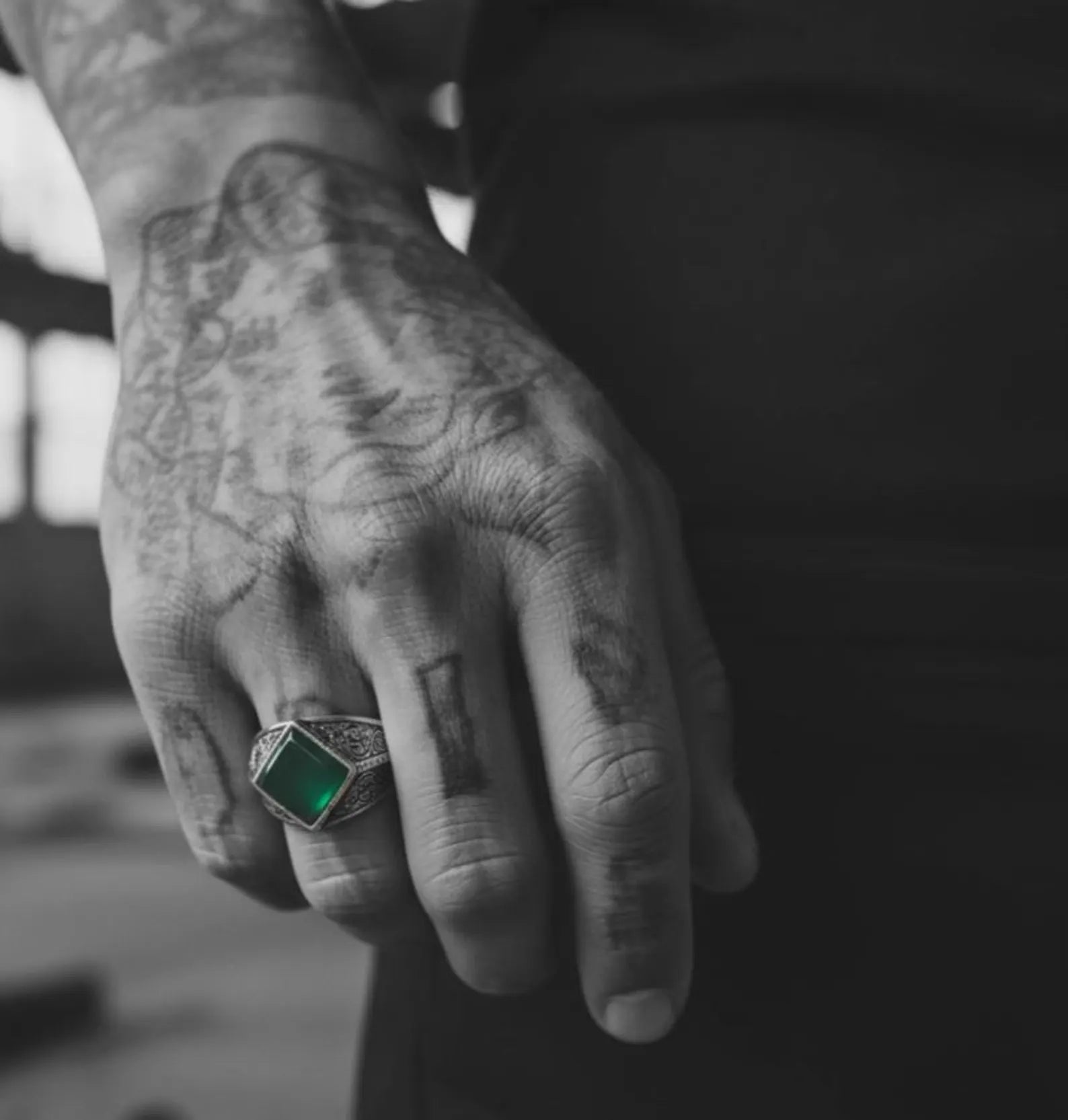 Vintage-inspired Green Onyx signet ring made from premium 925 sterling silver with hand-engraved baroque details, symbolic of strength, confidence, and masculine elegance.