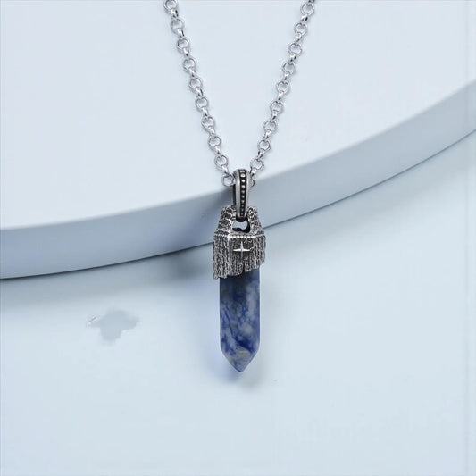 Long vintage-inspired men’s pendant necklace featuring a natural blue sodalite crystal carved into a polished point, set inside a handcrafted 925 sterling silver compass frame that symbolizes guidance, clarity, emotional balance, and inner peace — perfect for spiritual jewelry lovers and unique gift occasions.