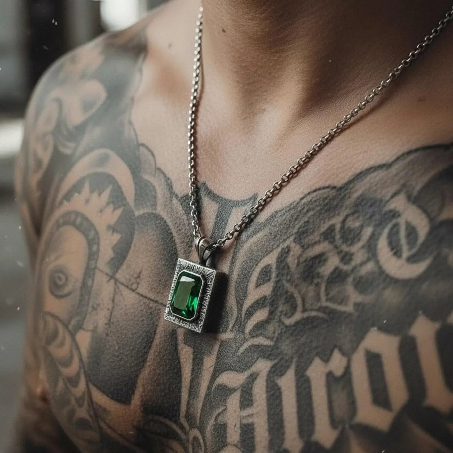 Elegant handcrafted emerald pendant necklace for men, combining minimalist yet bold chunky sterling silver design with a symbolic birthstone representing emotional balance and timeless masculine elegance.