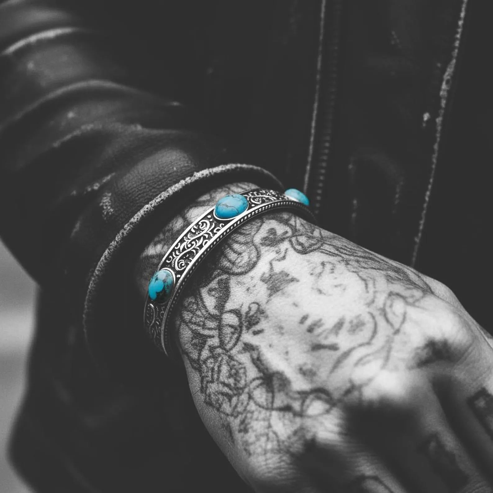 Southwestern turquoise cuff bracelet for men handcrafted from high-quality 925 sterling silver, featuring three natural turquoise stones set into an oxidized and hand-polished Western-inspired engraved cuff. A bold, vintage-style accessory perfect as a Christmas gift, anniversary gift, or personalized keepsake.