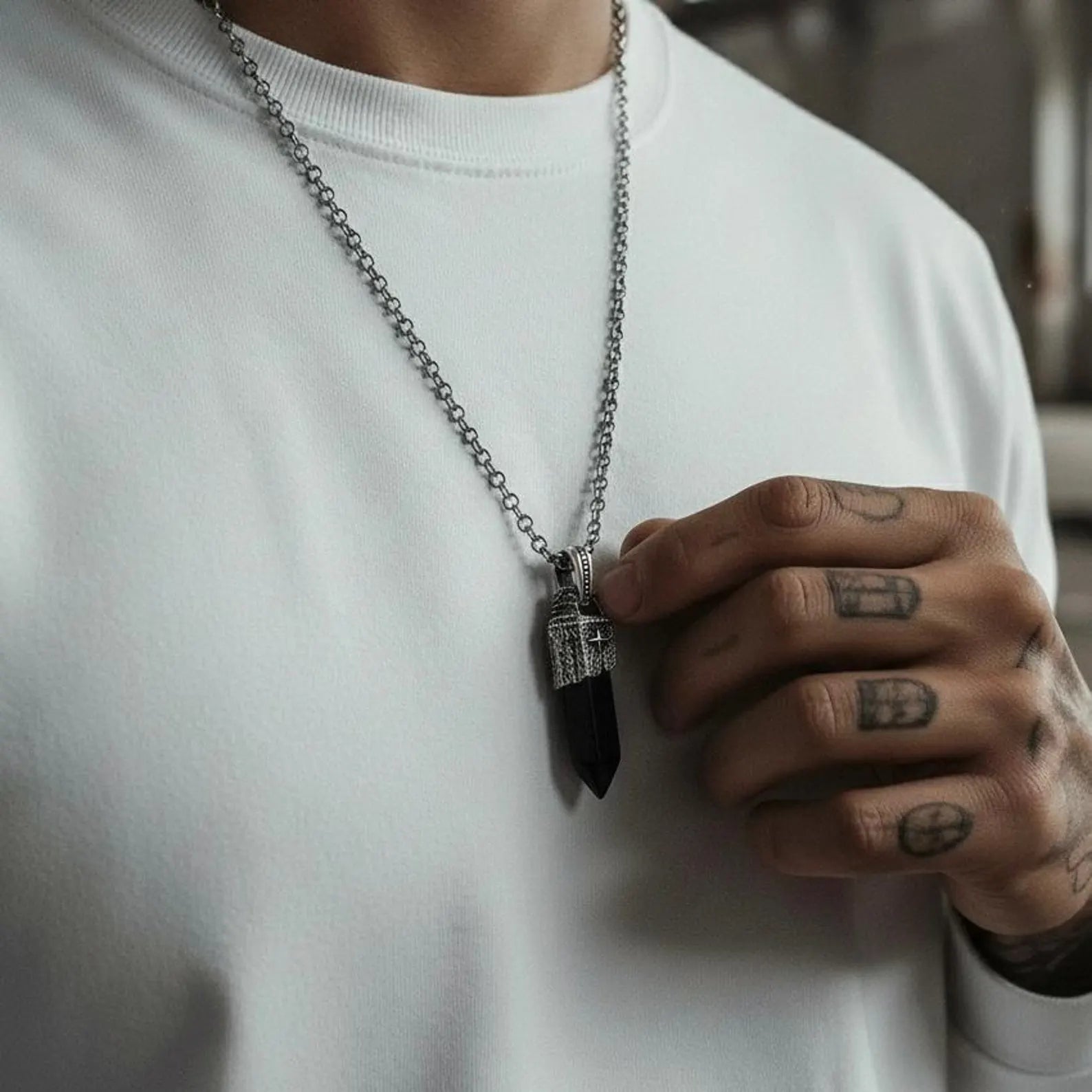 Premium sterling silver vintage-style obsidian pendant necklace with a bold black obsidian gemstone and detailed handcrafted engravings. Weighing 18g with chain, this unisex spiritual necklace offers a minimalist yet powerful statement, ideal for men who appreciate protective gemstones and unique personalized jewelry.