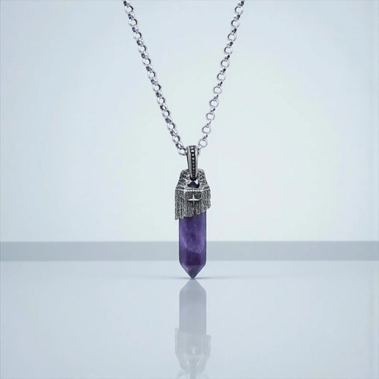 Close-up shot of a handcrafted sterling silver amethyst pendant necklace for men, featuring a natural purple amethyst gemstone set in a vintage-inspired nautical design with oxidized details, hanging on a 925 sterling silver chain.