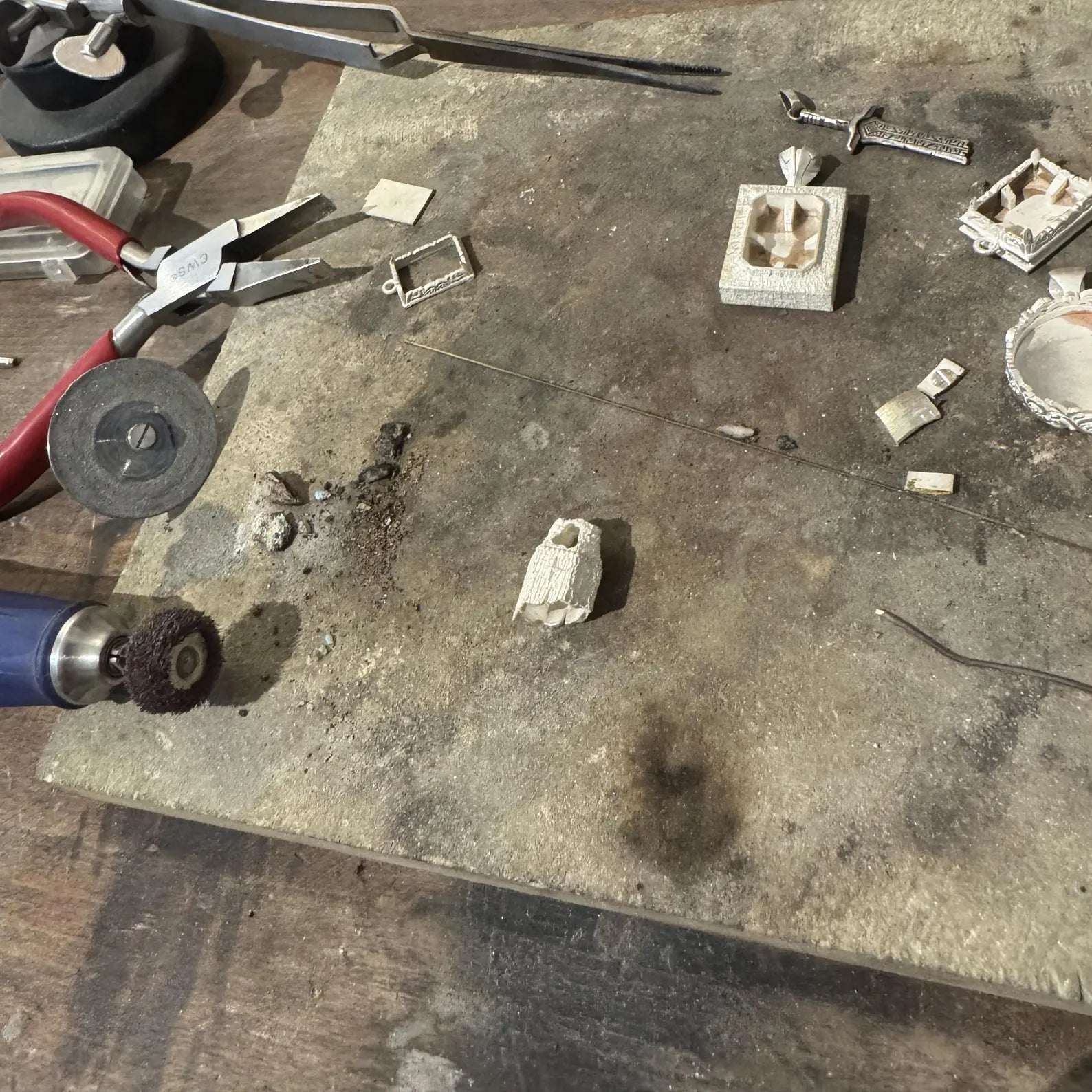 Side-angle view of a handcrafted men’s silver pendant necklace with a prominent purple amethyst gemstone, vintage-inspired nautical details, and premium hand-polished sterling silver craftsmanship.