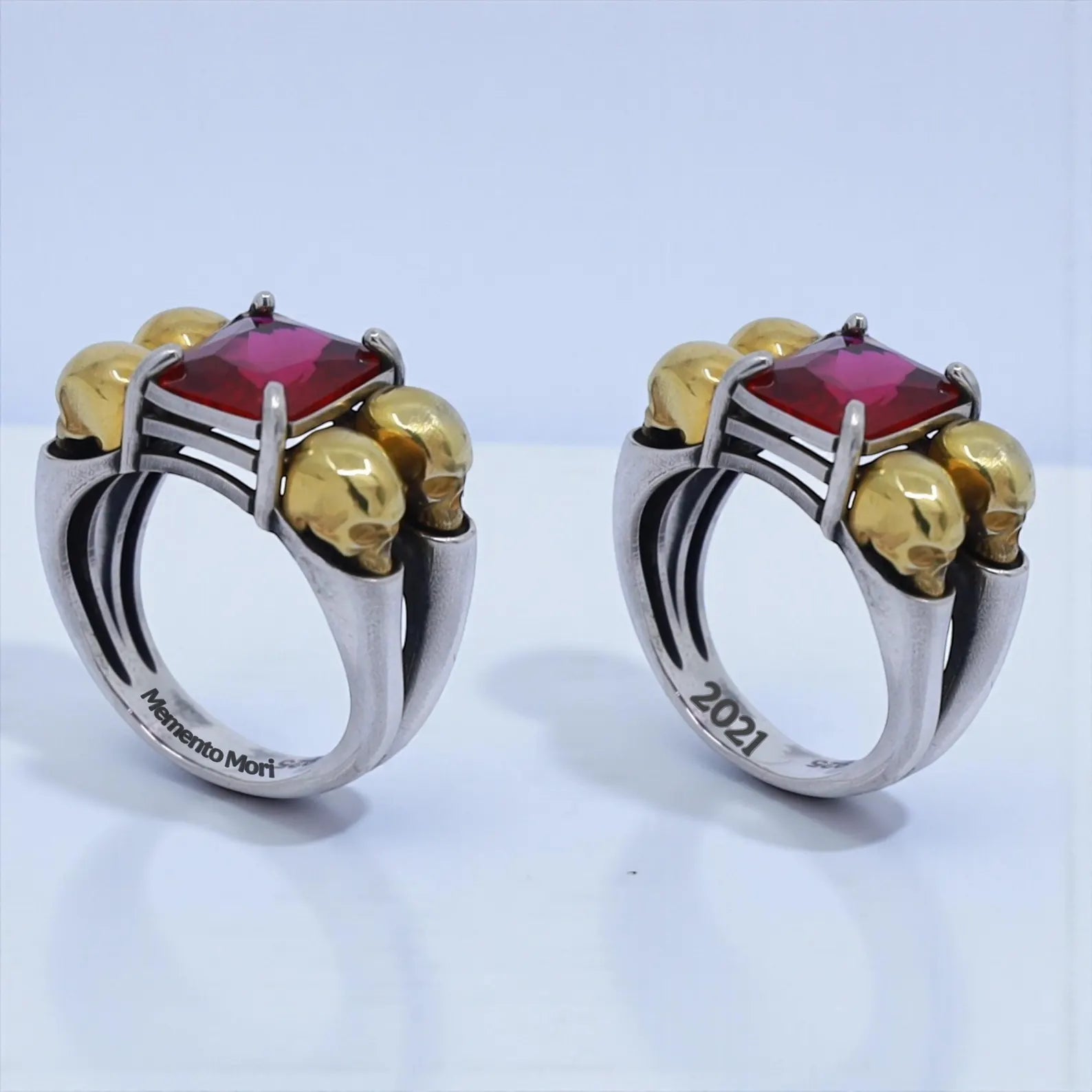 Detailed product display of a bold gothic skull ring with emerald CZ 12x8, blending vintage darkness and modern luxury—SEO-friendly for statement ring men, emerald gemstone jewelry, and gothic silver ring.