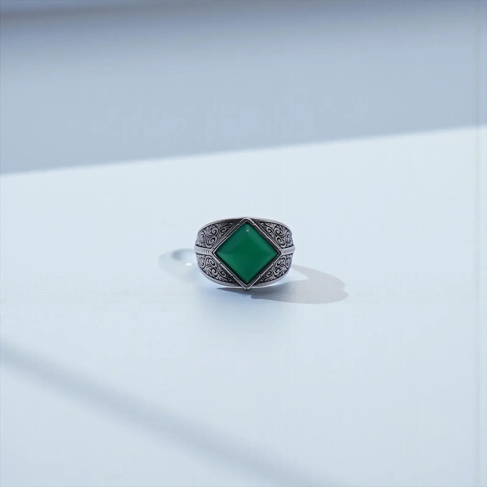 Bold and elegant men’s ring crafted with a high-quality sterling silver band and a polished 10x10 natural green onyx stone, perfect for fashion-forward men seeking unique handcrafted jewelry.