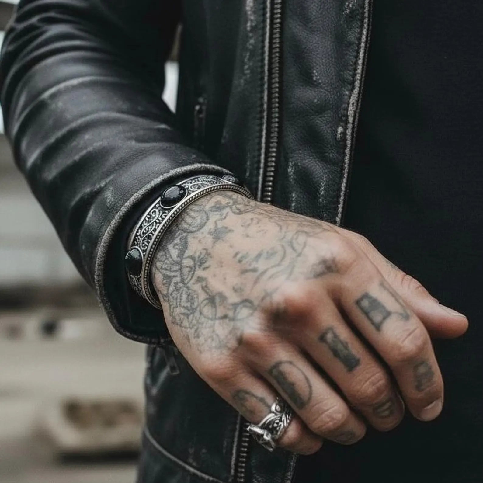 Premium handcrafted sterling silver biker cuff bracelet with natural black onyx stones, showcasing bold masculine lines, oxidized texture, and perfect for Christmas, Valentine’s Day, or anniversary gifts.