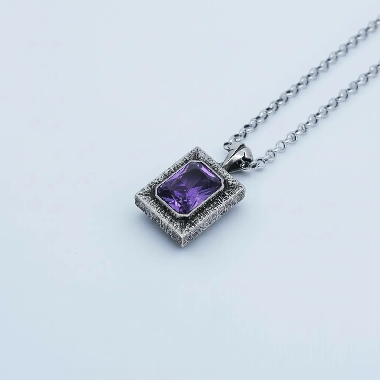 Handcrafted 925 sterling silver amethyst emerald-cut birthstone pendant necklace for men, featuring a bold chunky vintage-inspired design and a deep purple gemstone that offers elegance, strength, and luxury.