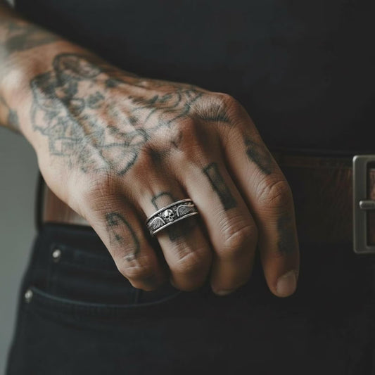 High-resolution image of a sterling silver biker skull ring featuring wings and oxidized detailing, highlighting the masculine gothic style and premium handcrafted quality ideal for rebels and riders.