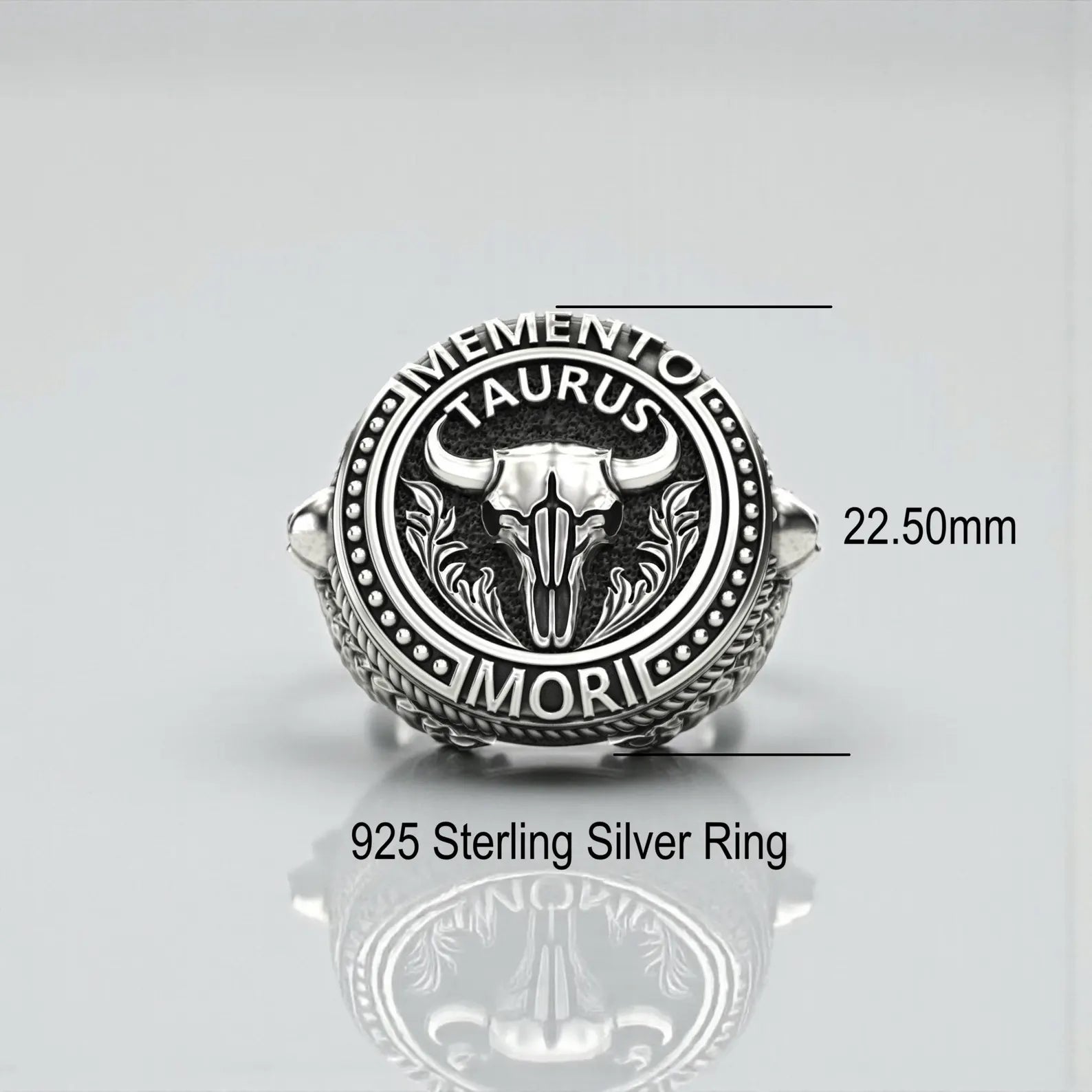 Sterling silver Taurus skull ring with Memento Mori inscription, designed for astrology lovers and biker style enthusiasts, highlighting bold craftsmanship and dark gothic aesthetics.