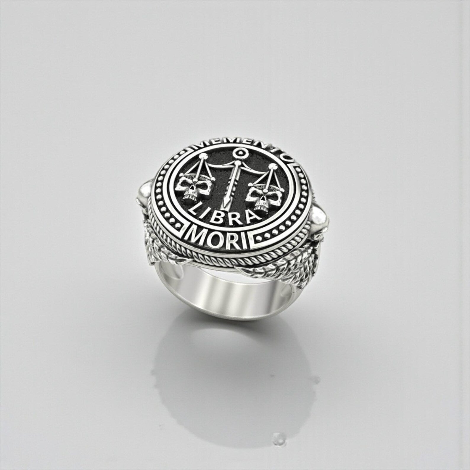Handcrafted Libra zodiac skull ring in sterling silver, representing balance, inner strength, wisdom, and living with intention through gothic symbolism.