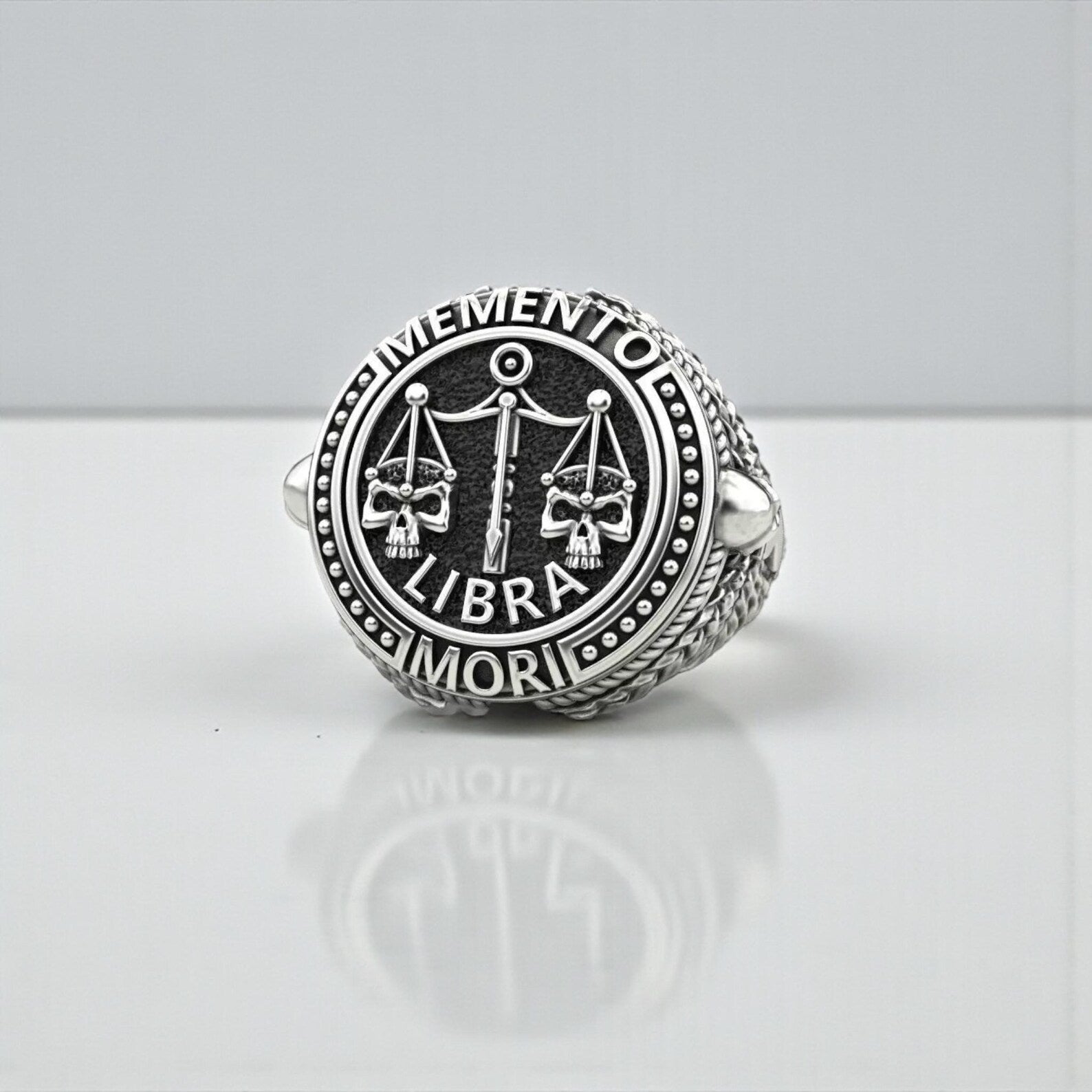 Handcrafted Memento Mori Libra ring made from high-quality 925 sterling silver, featuring a skull and scale design that symbolizes balance, justice, and mortality for astrology enthusiasts.