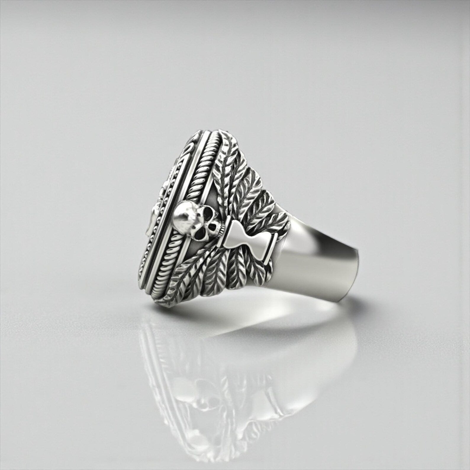 Detailed view of a Memento Mori Leo ring highlighting the lion skull centerpiece, oxidized silver finish, and bold handcrafted textures.