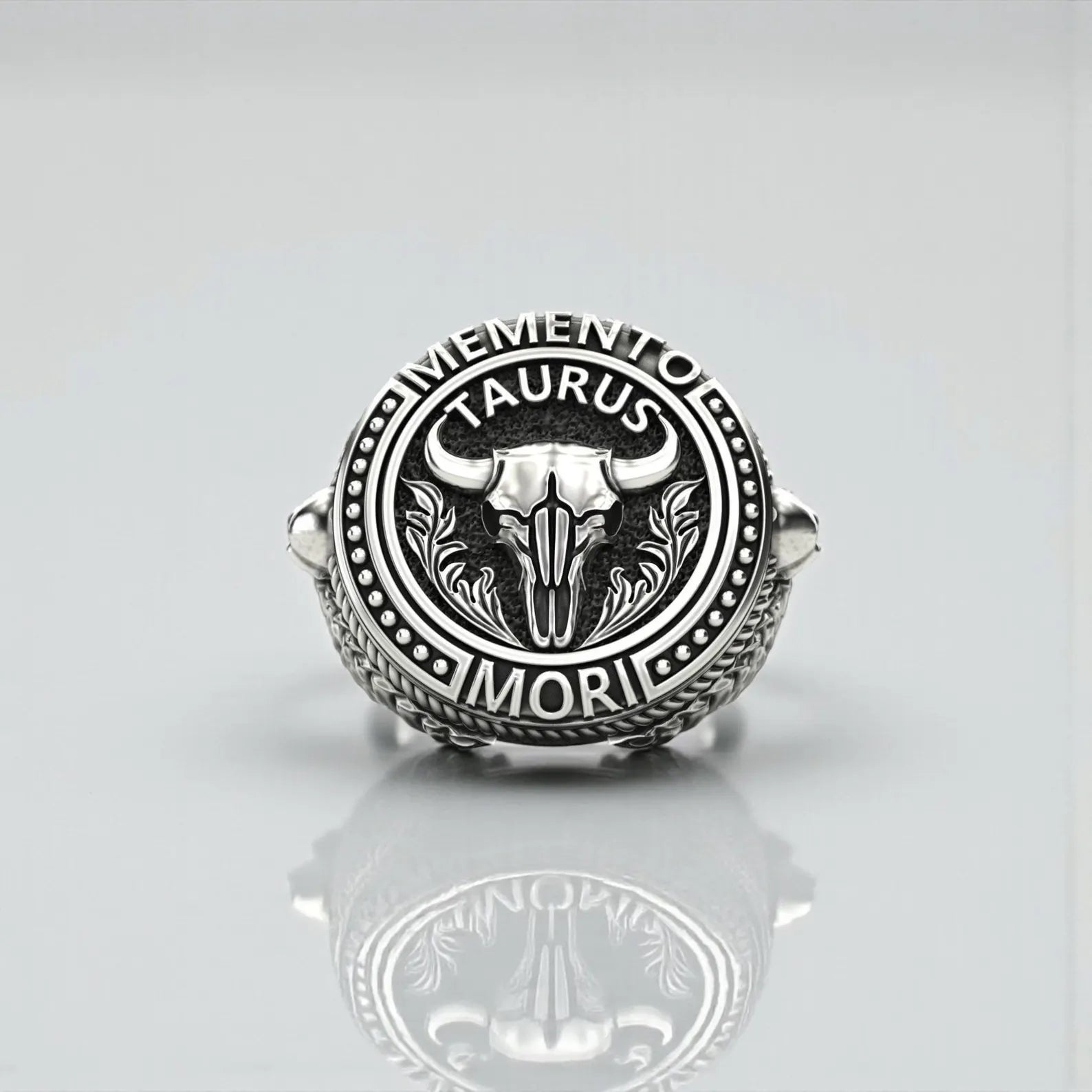 Unique Taurus signet ring for men with bull skull and Memento Mori symbolism, showcasing handcrafted silver artistry and powerful gothic zodiac design.