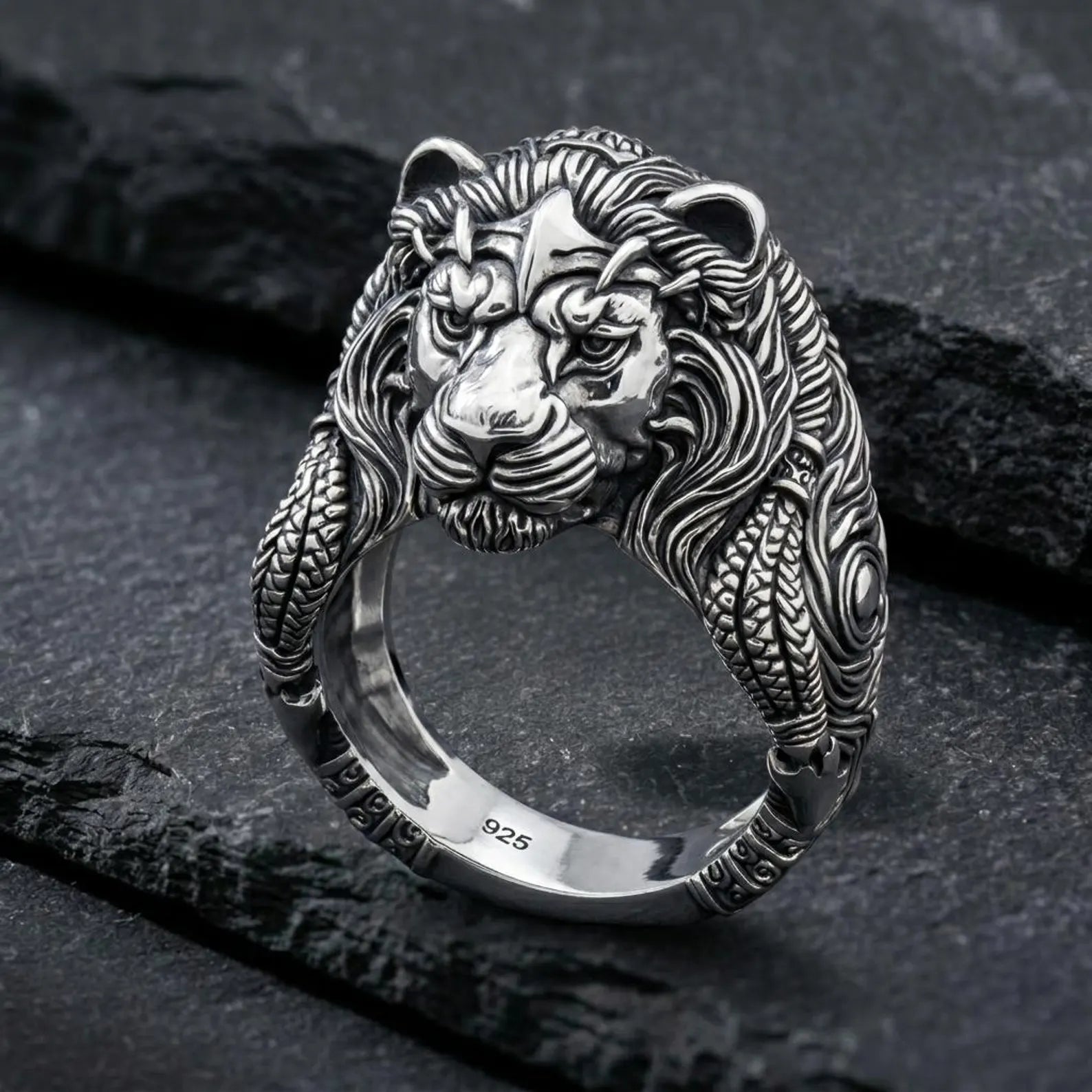 Bold biker style lion ring with deep engravings and strong masculine look, unique silver statement jewelry