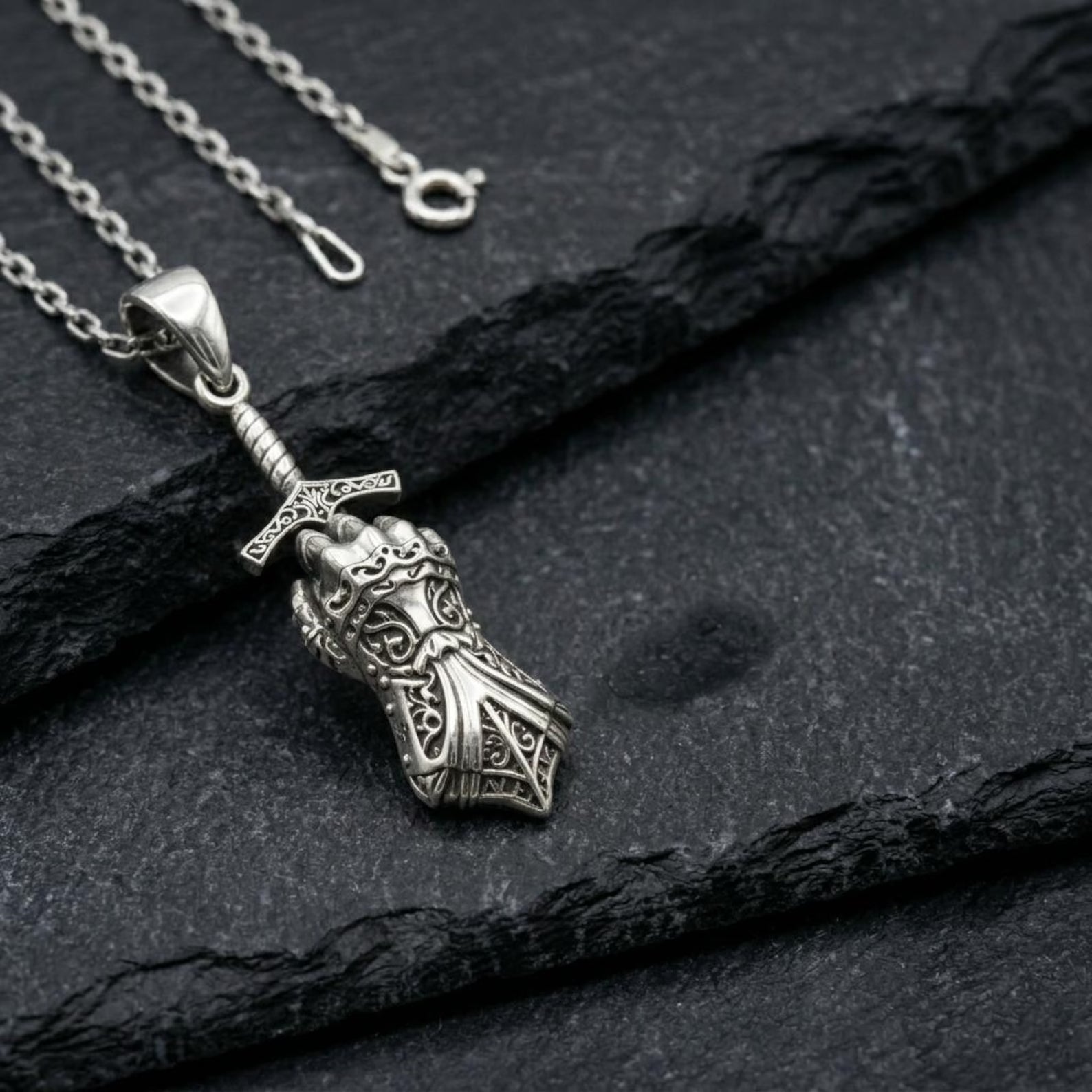 Unique sterling silver medieval gauntlet pendant for men, featuring intricate armor texture and handcrafted details, symbolic jewelry representing protection, courage, and knight heritage
