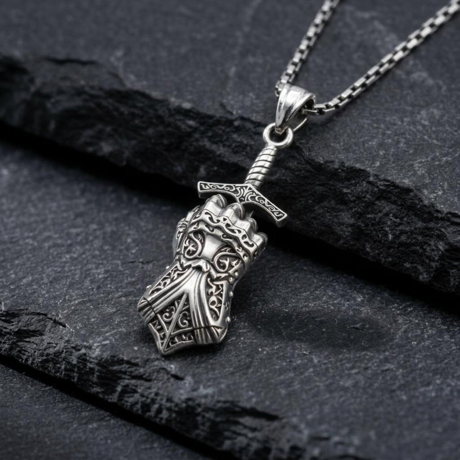 Medieval knight gauntlet pendant necklace crafted from 925 sterling silver, featuring detailed armored glove design with oxidized finish, handcrafted bold statement jewelry symbolizing strength, protection, and warrior spirit