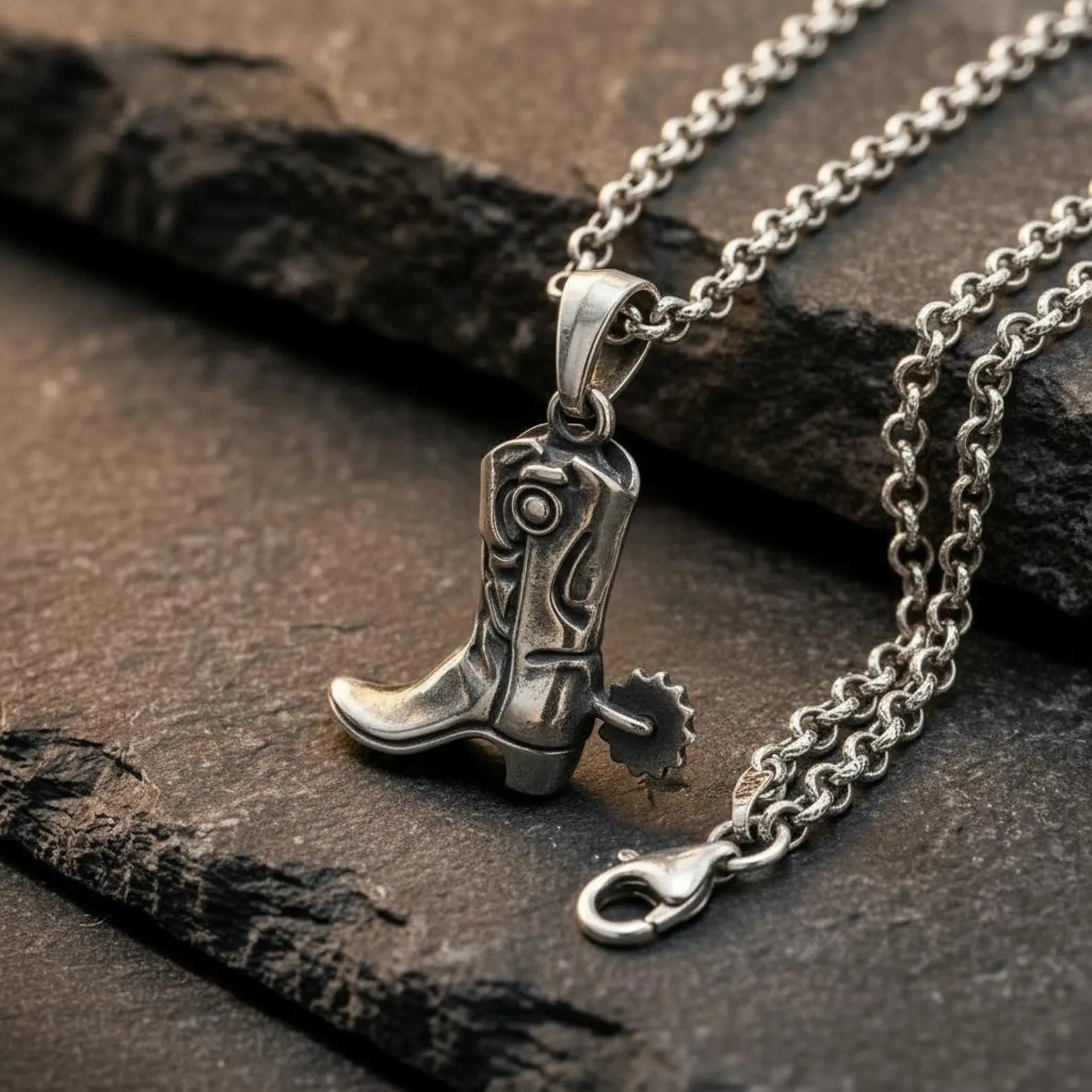 Rustic western style cowboy boot pendant featuring intricate handcrafted details and timeless country charm.