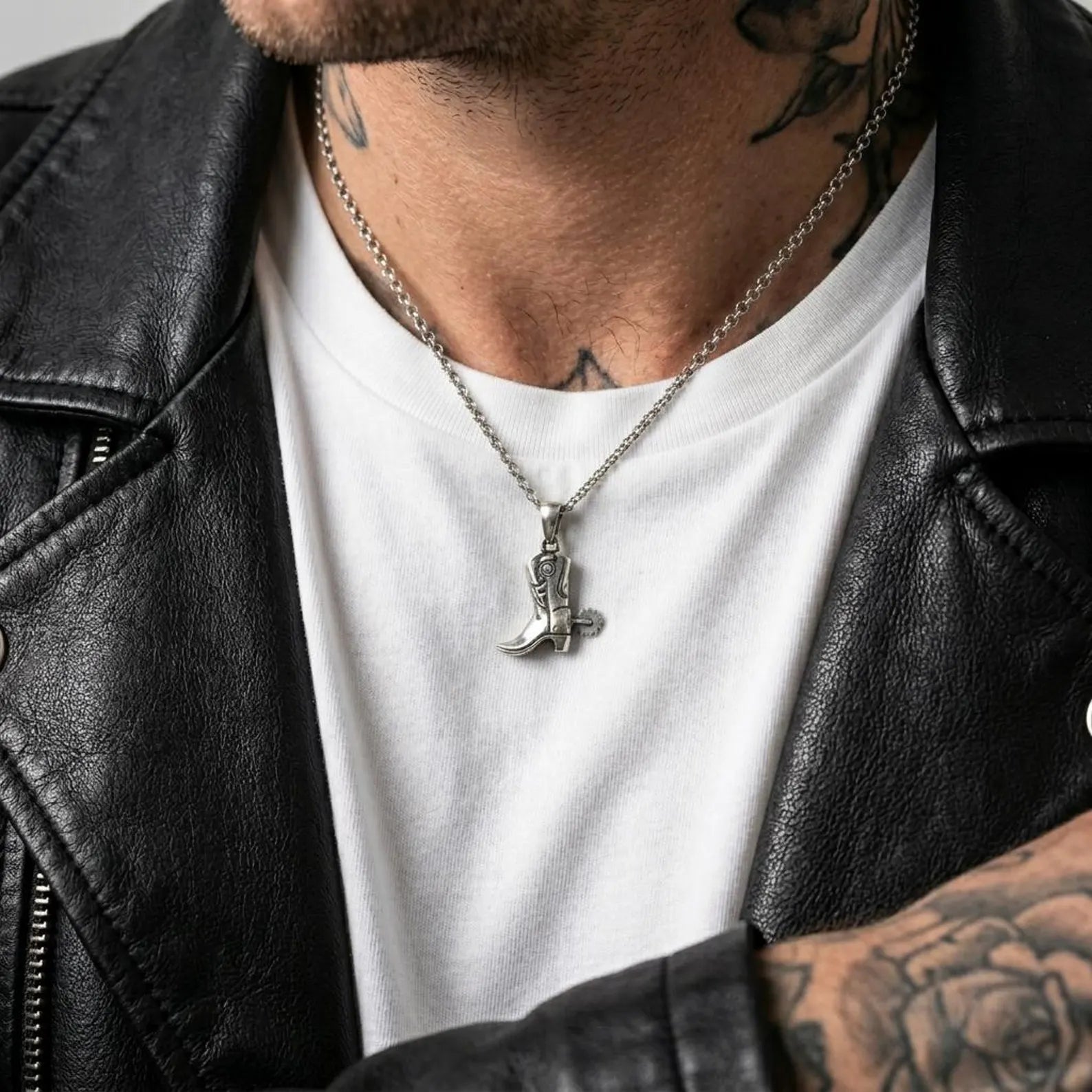 Wild West cowboy boots pendant necklace crafted in solid 925 sterling silver for western jewelry enthusiasts.