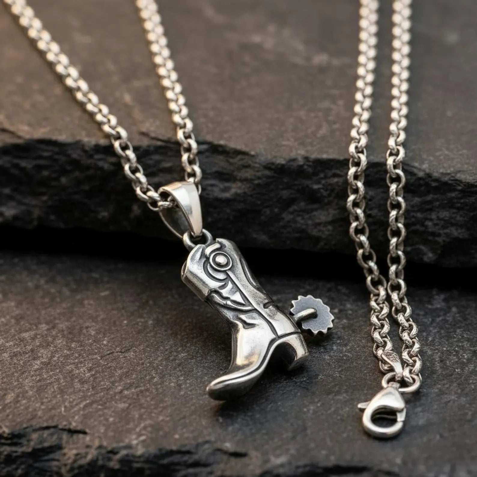 Unique Wild West necklace charm featuring a miniature cowboy boot crafted with exceptional silver detailing.