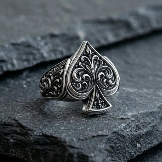 Handcrafted Gothic Ace of Spades signet ring for men made from solid 925 sterling silver, featuring an intricately engraved spade emblem surrounded by medieval ornamental patterns with an oxidized vintage finish for a bold statement look.