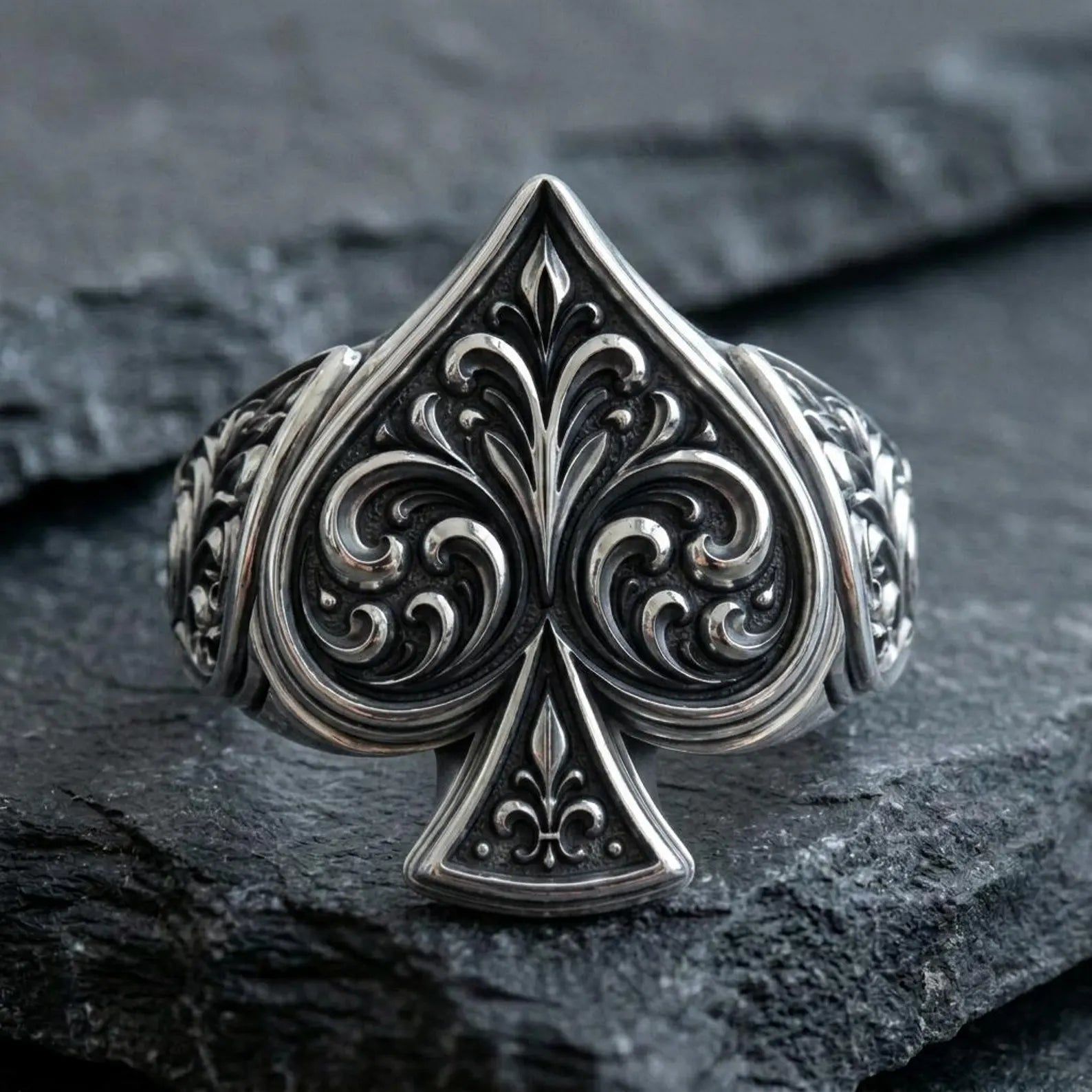 Premium 925 sterling silver Gothic poker ring featuring a bold Ace of Spades centerpiece with intricate ornamental scrollwork, vintage oxidized finish, and a masculine signet silhouette designed for everyday wear.