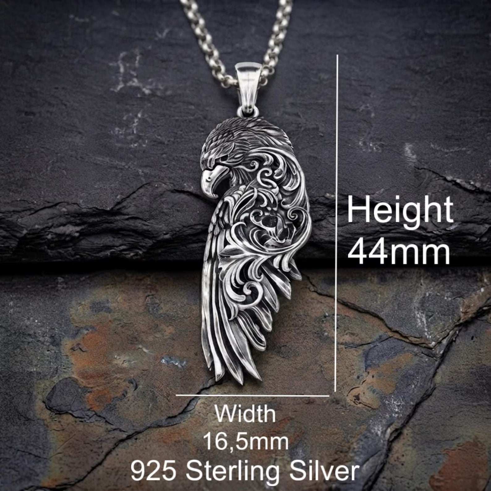 Luxury sterling silver mythological pendant showcasing a detailed Raven Wing design with ornate Baroque engravings, handcrafted feather textures, vintage oxidized finish, and symbolic Norse inspiration representing wisdom, freedom, and spiritual guidance.