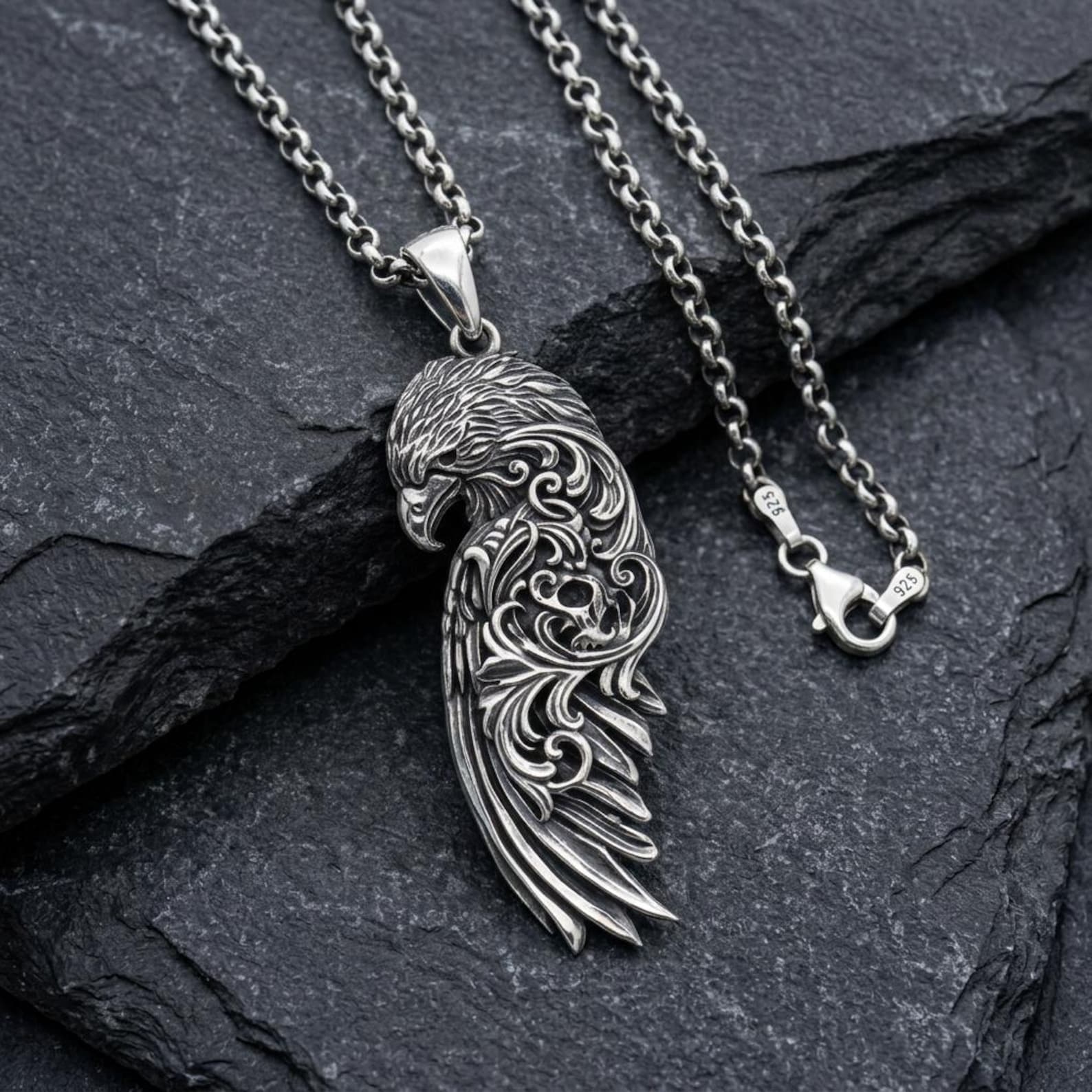 Premium Raven Wing necklace crafted from solid sterling silver with elaborate Baroque ornamentation, handcrafted feather detailing, oxidized vintage finish, and symbolic mythology-inspired artistry designed for lovers of Gothic and Norse jewelry.