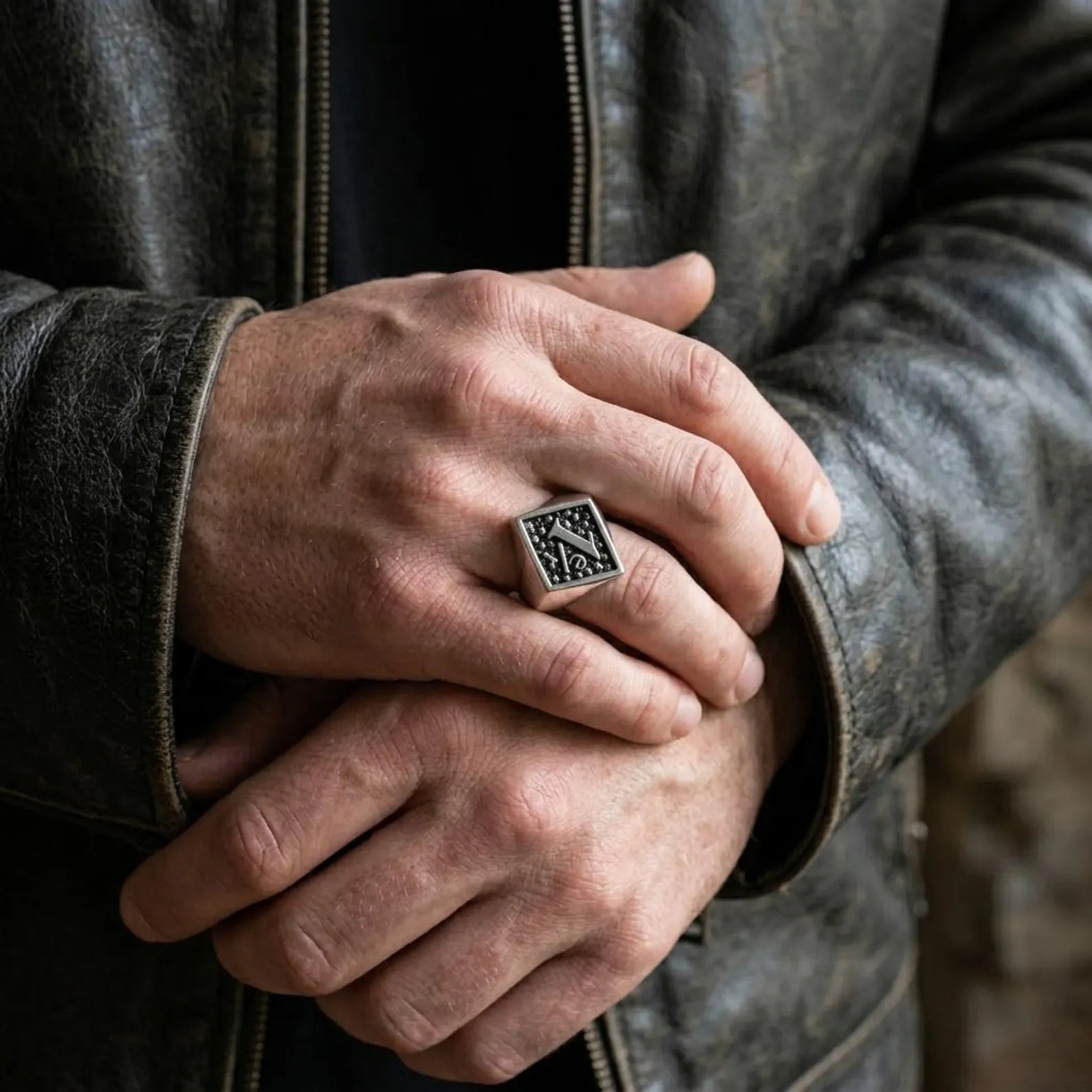 Premium sterling silver moto biker ring featuring a detailed skull design, handcrafted craftsmanship, oxidized finish, and authentic one percenter inspired style.
