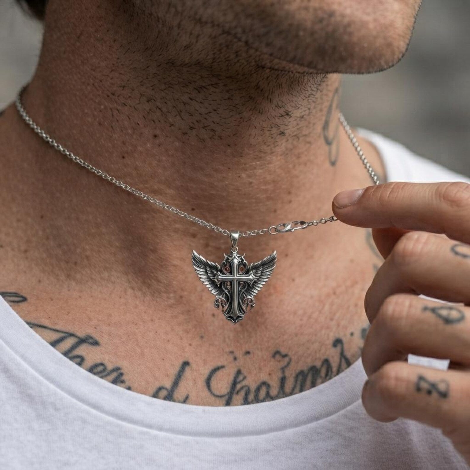 Solid 925 sterling silver religious pendant displaying a beautifully detailed Winged Cross design with elaborate Baroque engravings, oxidized antique finish, and handcrafted craftsmanship that represents hope, guidance, protection, and unwavering Christian devotion.