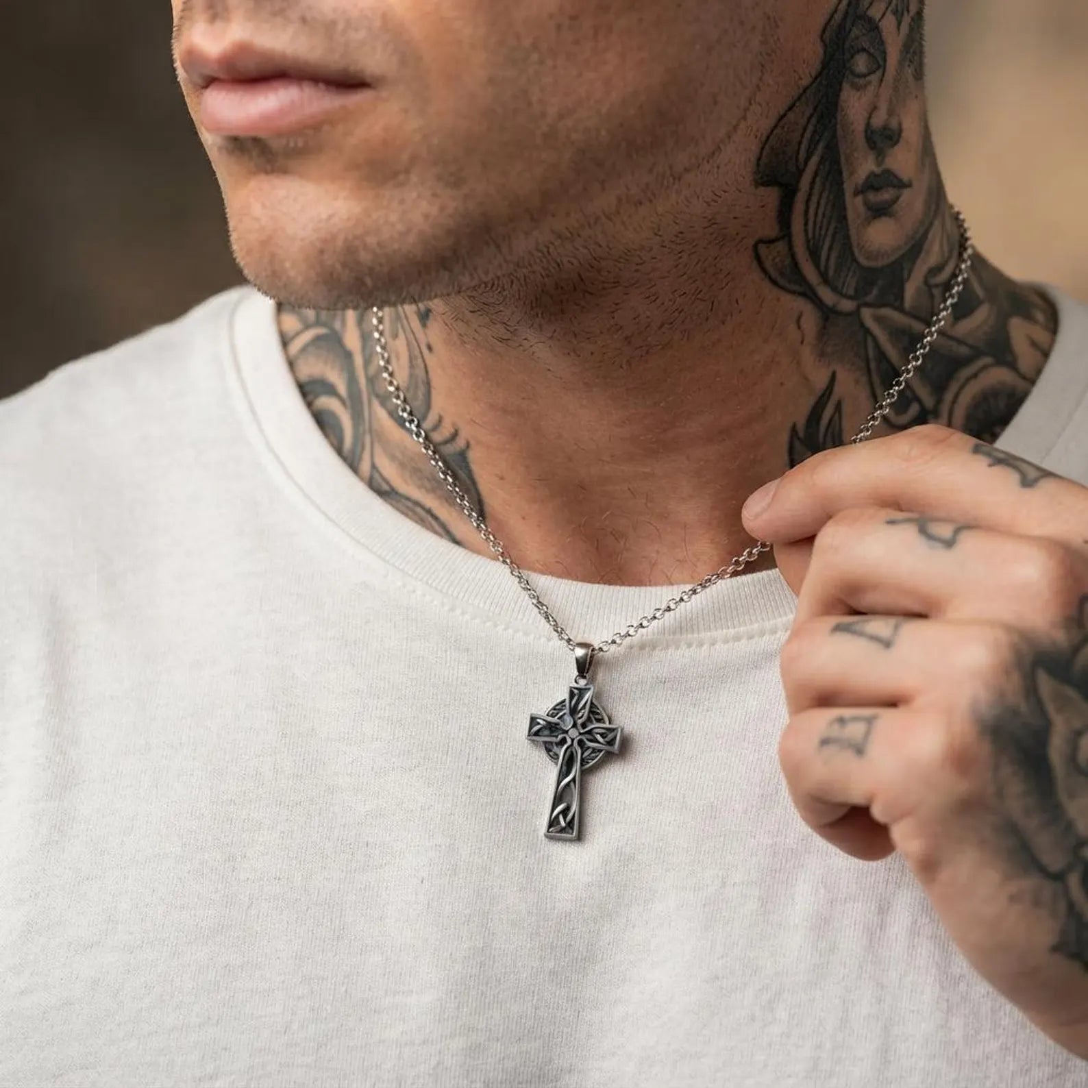 Men's sterling silver Celtic Cross Pendant Necklace showcasing handcrafted Celtic knot details, traditional Christian design, and premium artisan silver craftsmanship.