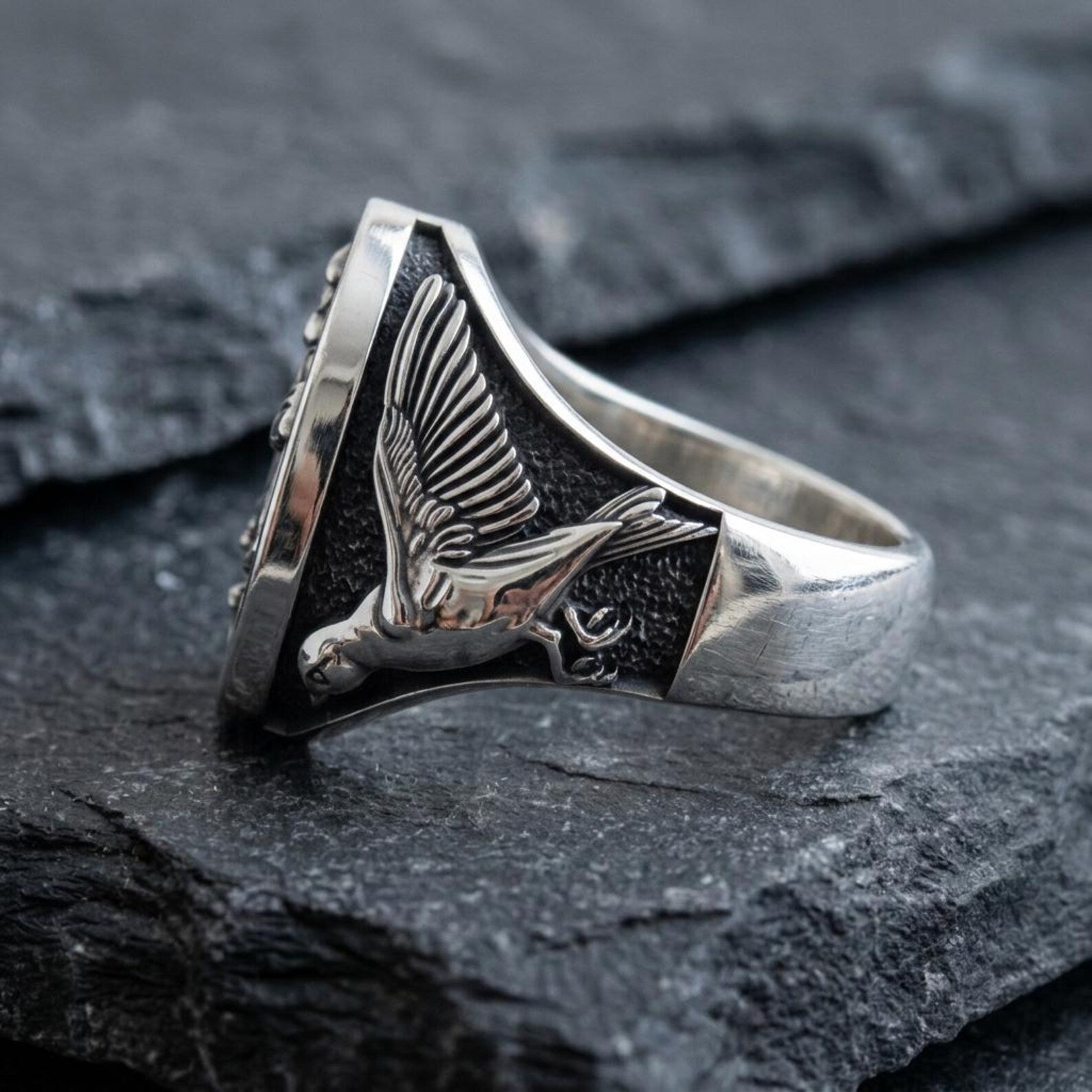 Artisan crafted sterling silver anchor ring inspired by maritime tradition, featuring an elegant swallow design and bold vintage nautical craftsmanship.