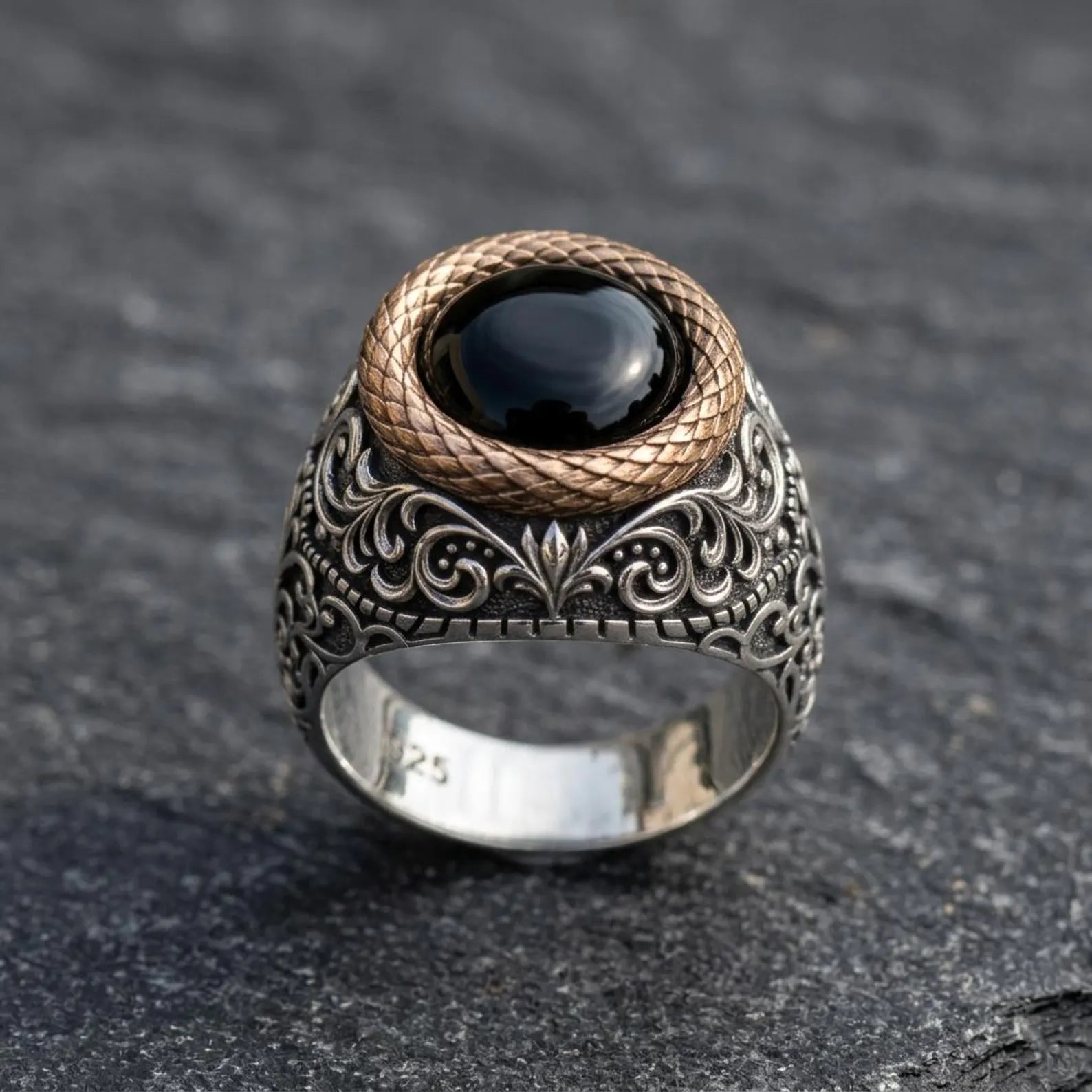 Unique sterling silver black onyx signet ring for men with ornate Victorian engravings and a polished natural round black onyx centerpiece.