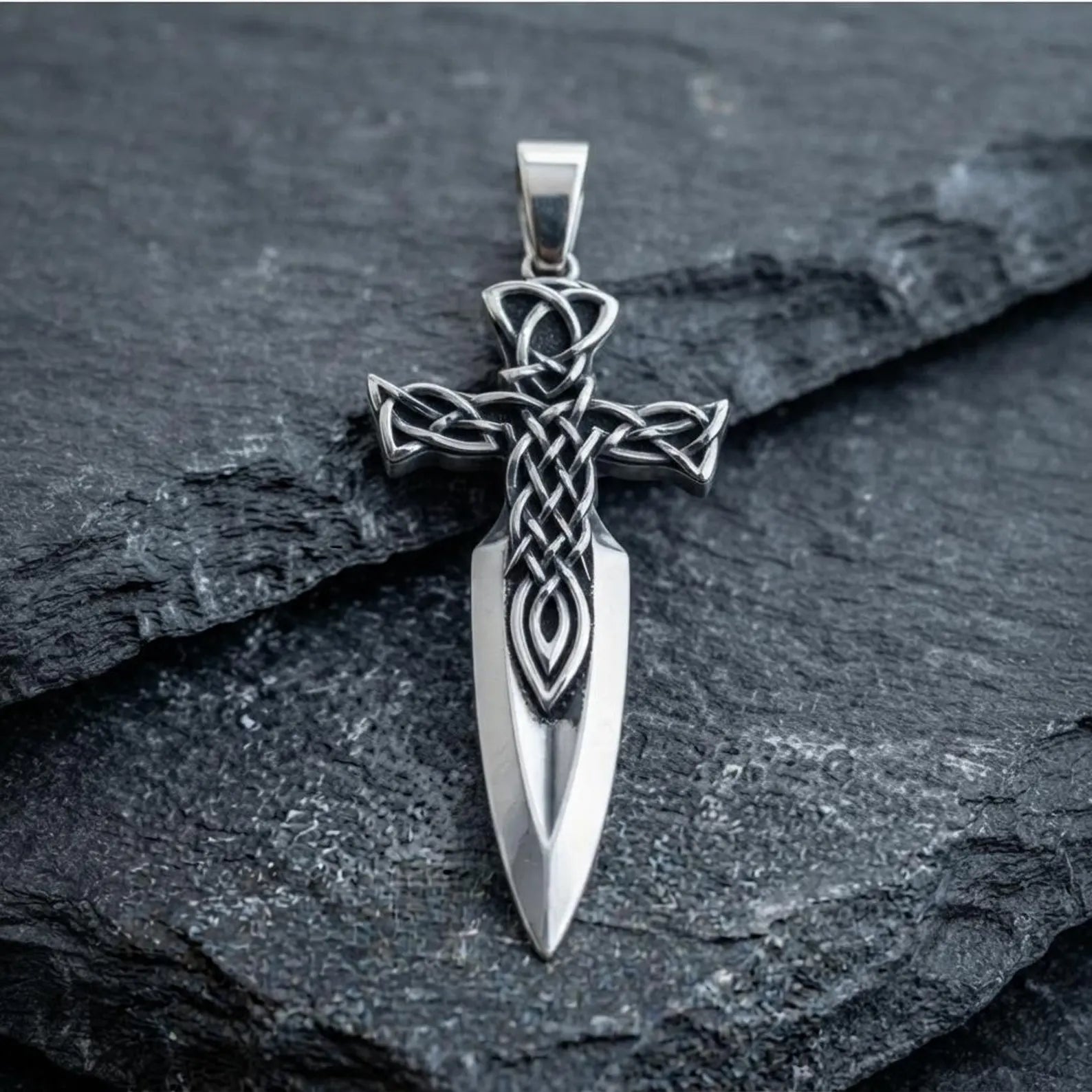Solid 925 sterling silver medieval Cross Sword pendant necklace decorated with traditional Celtic patterns, handcrafted for those who appreciate Christian faith, Irish heritage, and historical warrior jewelry.