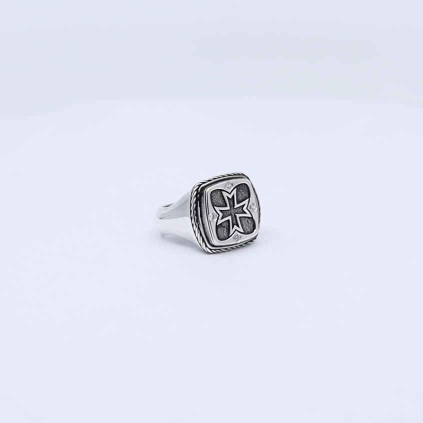 Sterling silver men’s pinky ring with a raised cross symbol, reflecting faith and spiritual strength, handmade with care and timeless elegance for those seeking Christian-inspired jewelry with a classic masculine touch.